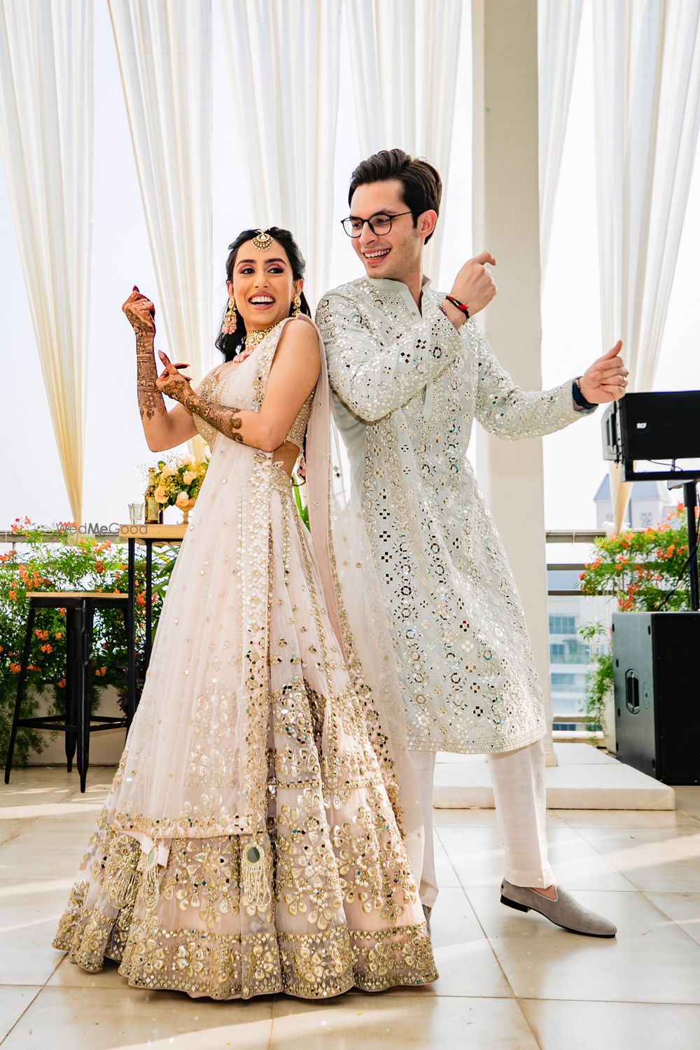 Photo of Couple dances away on the mehendi