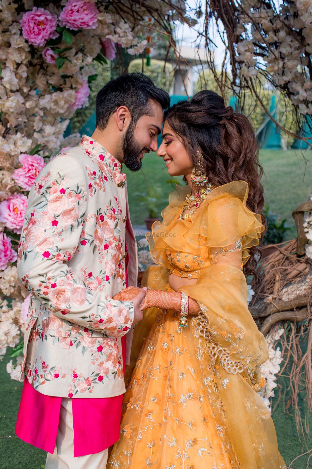 Photo of Mehendi couple portrait with bride and groom in quirky outfits