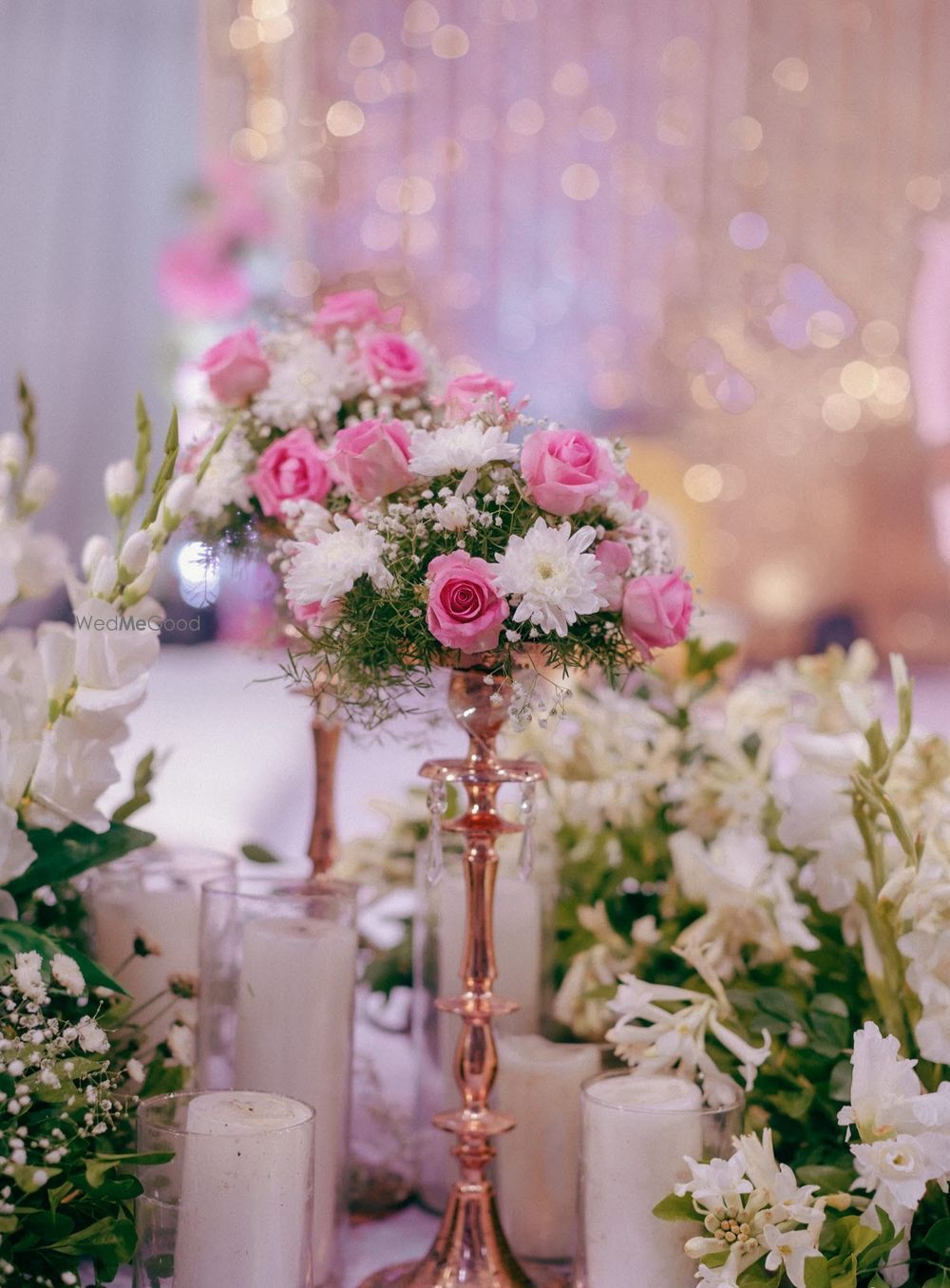 Photo of Beautiful floral centerpiece with white and pink roses