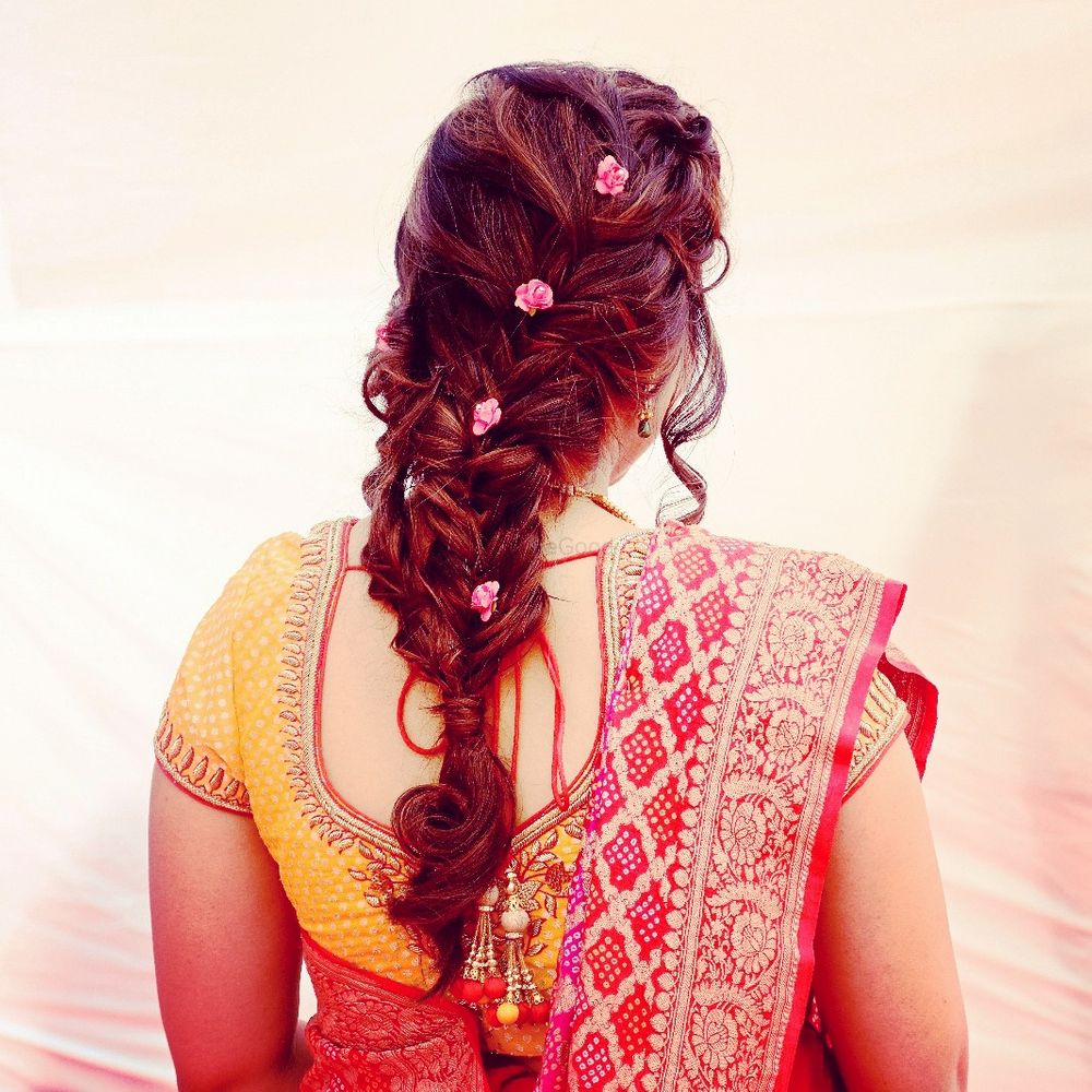 Photo of Floral braided hairstyle