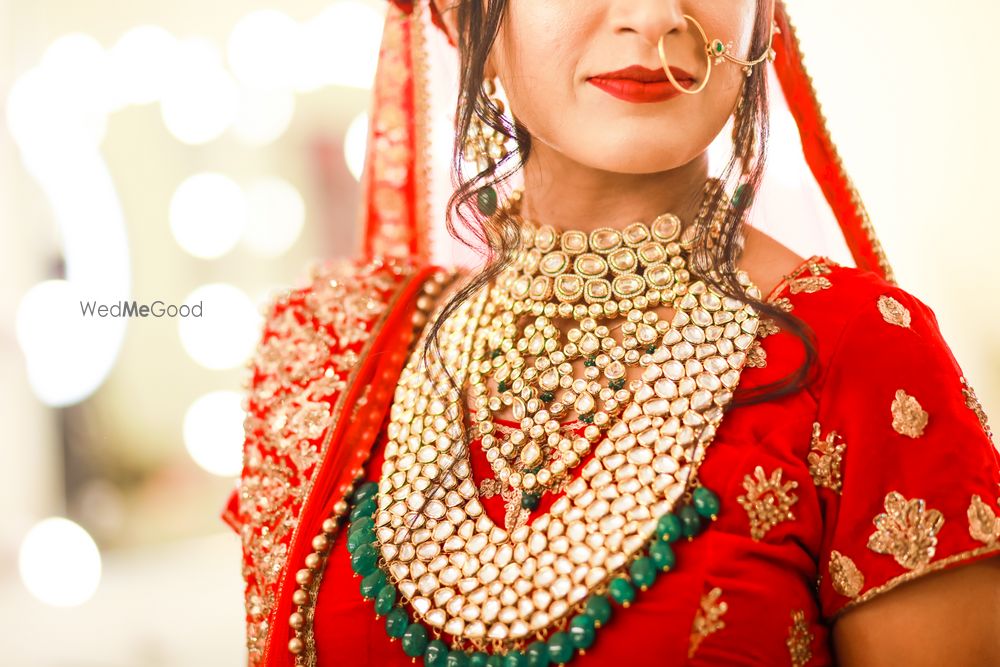 Photo of Layered heavy bridal necklace with stones green