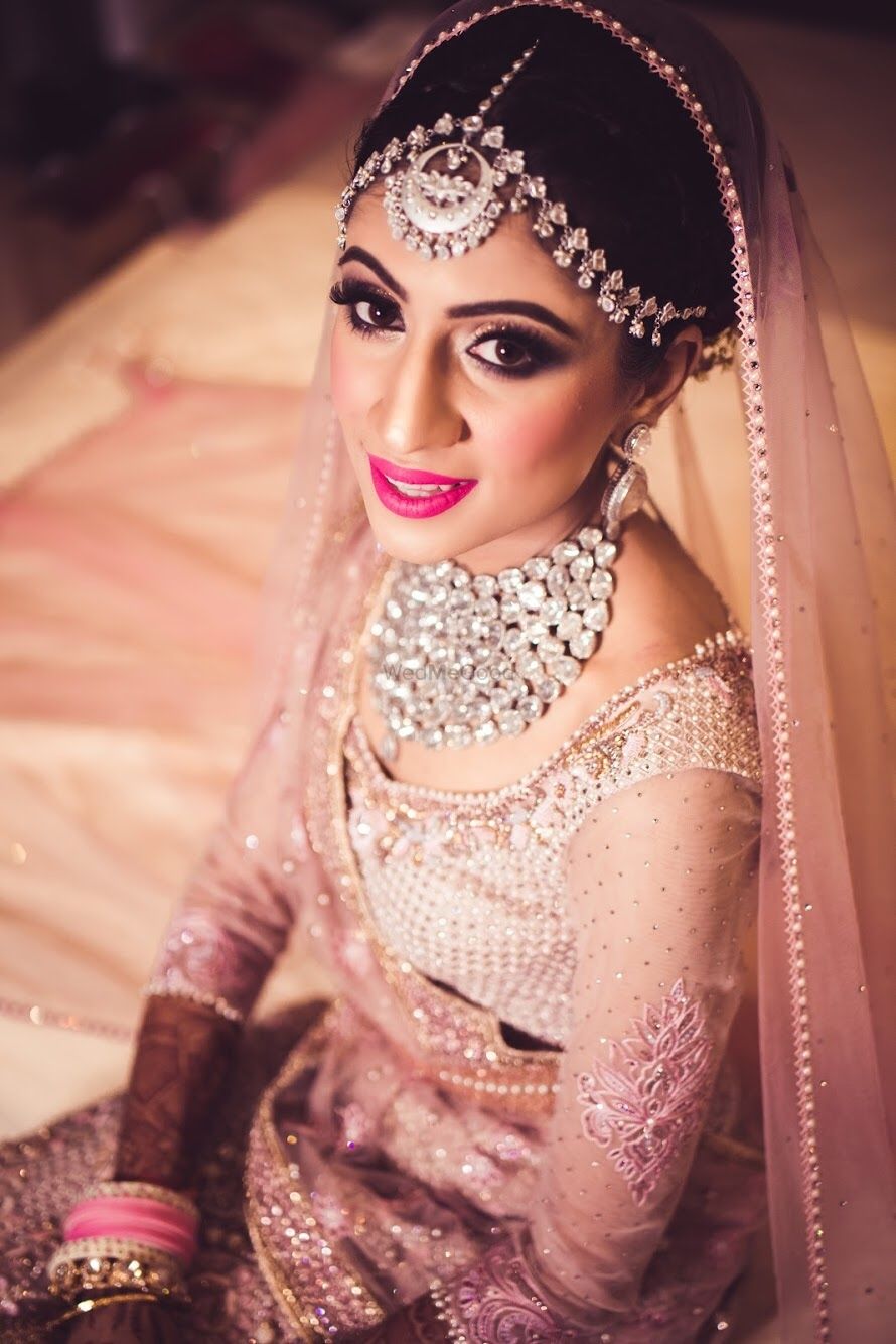 Photo of Pretty bride wearing silver jewellery