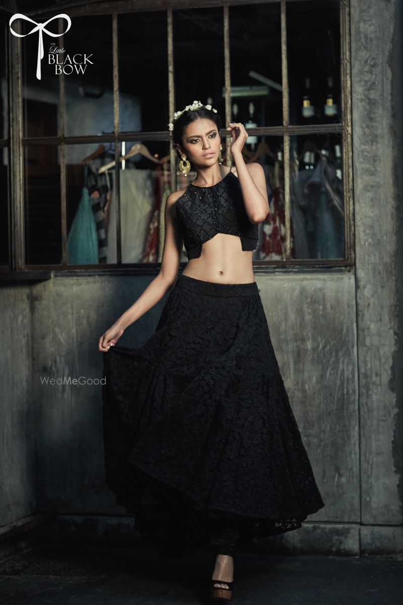 Photo of black crop top and skirt