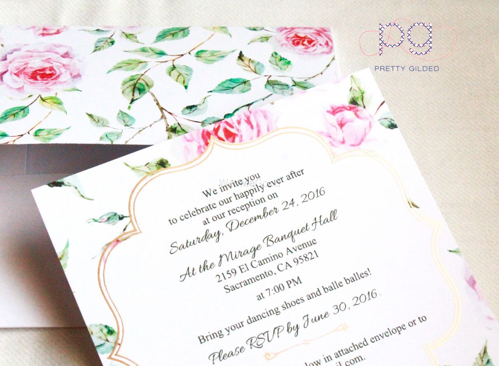 Photo of Floral print wedding card