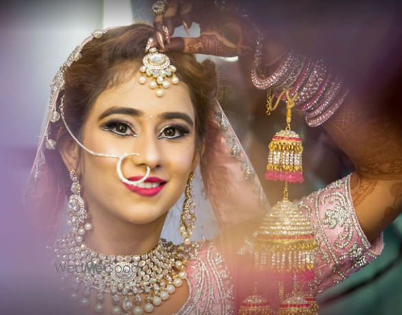 Photo By Wedding by Fotomagic - Photographers