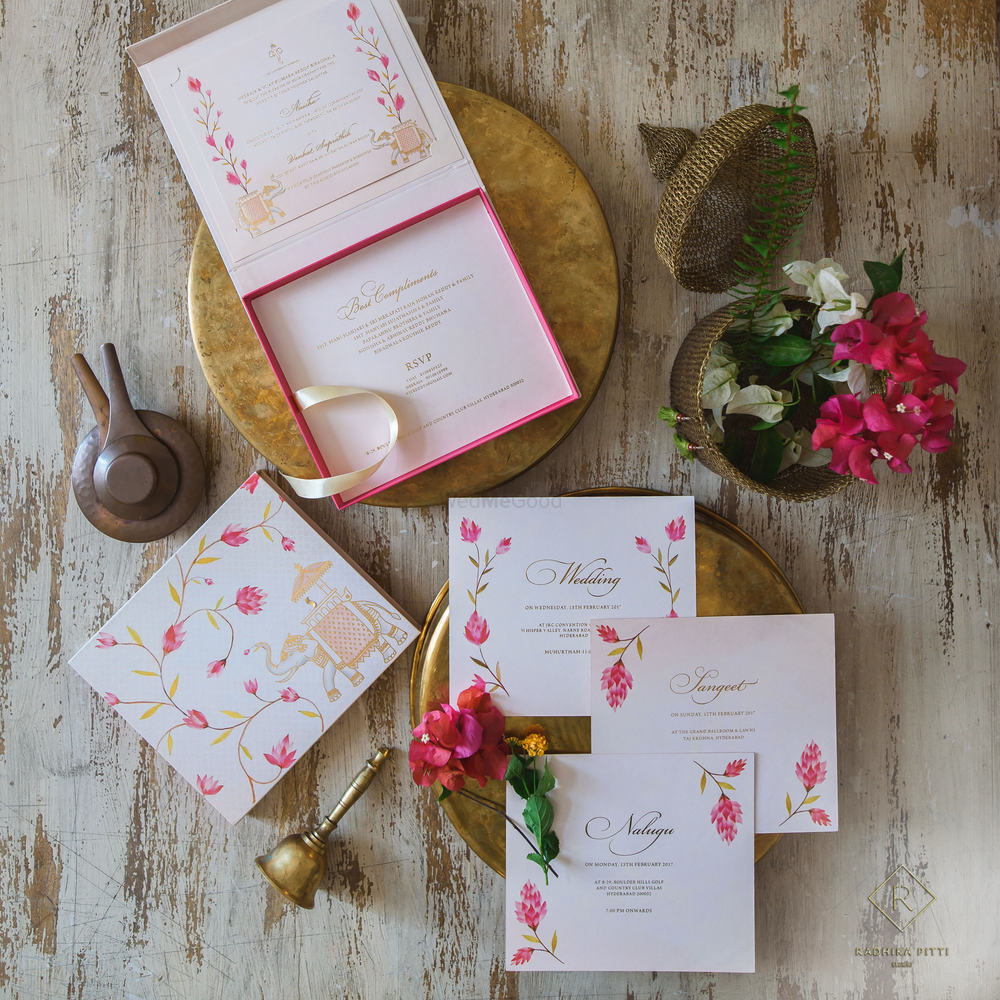 Photo of White and pink floral wedding card with box