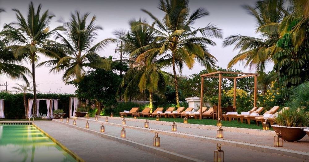 Photo of A subtle yet pretty decor setup for an intimate sangeet or mehendi in the evening!