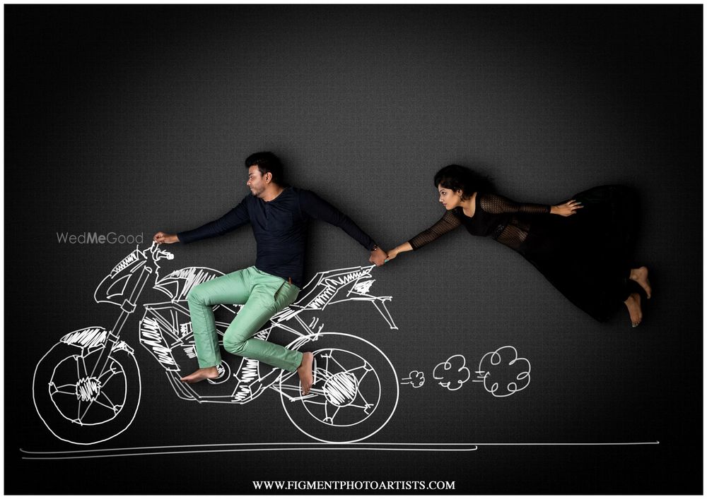 Photo of Chalkboard pre wedding shoot with bike