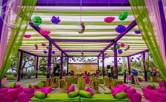 Photo of Colourful mehendi decor with hanging paper lamps