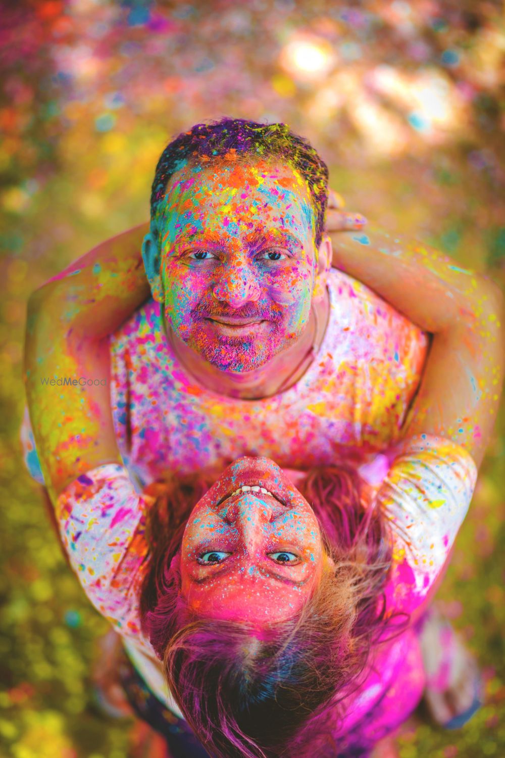 Photo of Holi themed couple portraits