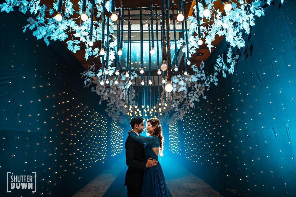 Photo of Romantic couple shot with nice sangeet decor