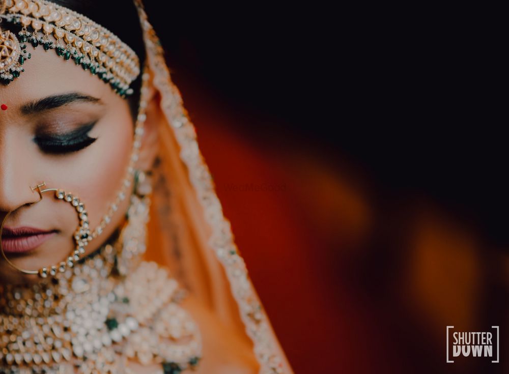 Photo of wedding day bridal close up shot wearing a nath