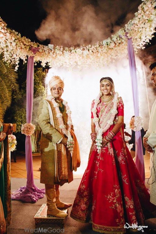 Photo of white and lavender floral mandap