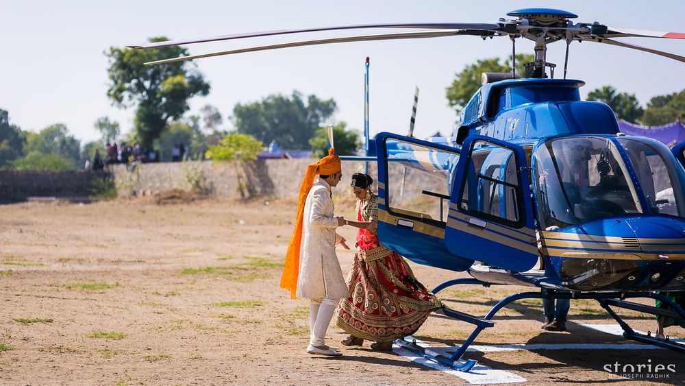 Photo of Bride and groom entering in chopper