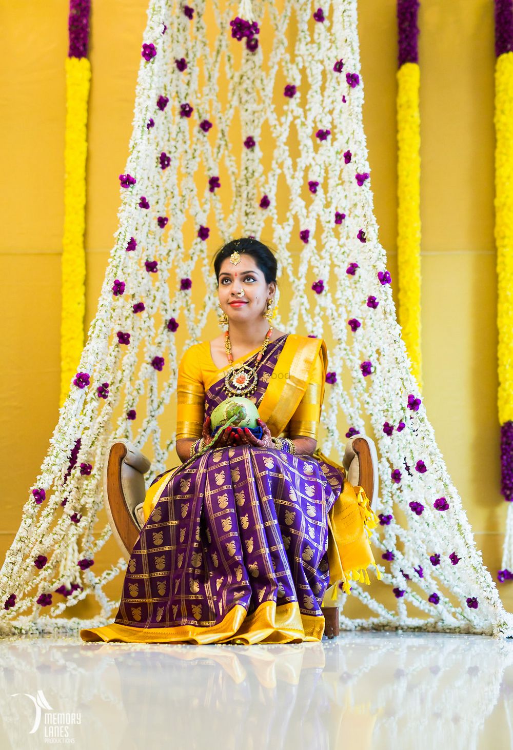 Photo of purple and yellow kanjeevaram saree