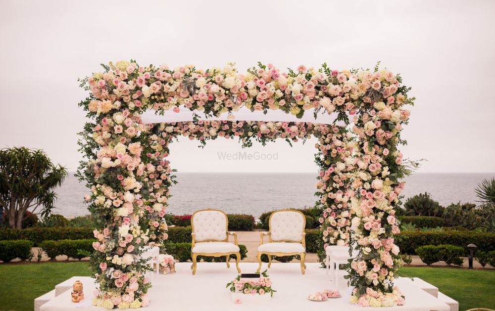 Photo of Floral mandap by the sea.