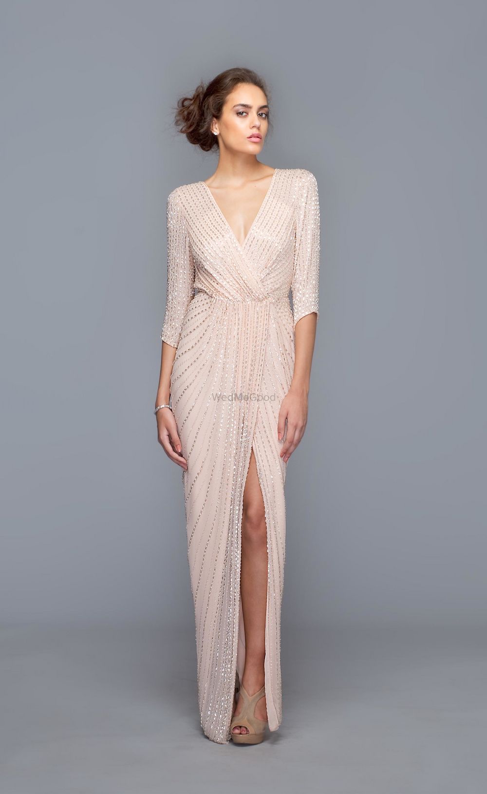 Photo of Shimmery beige evening gown in wrap around style