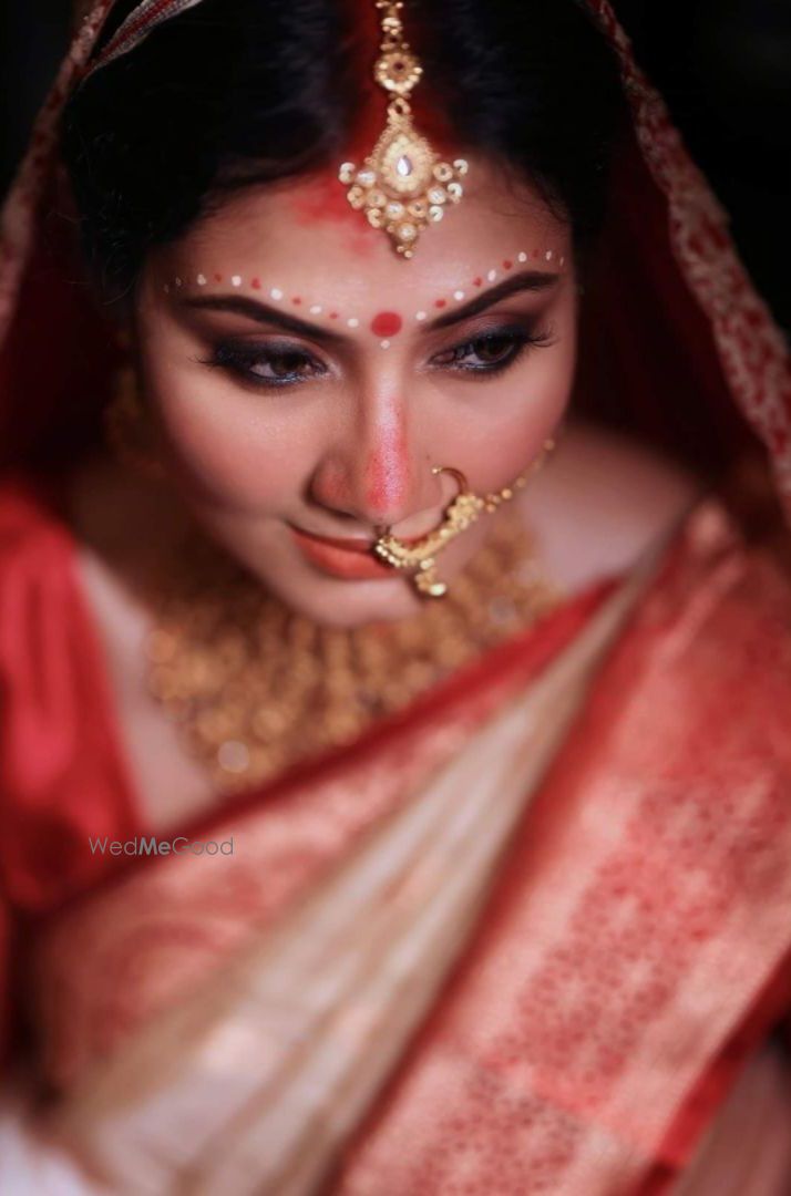 Photo By KohlEyes to BerryLips - Bridal Makeup