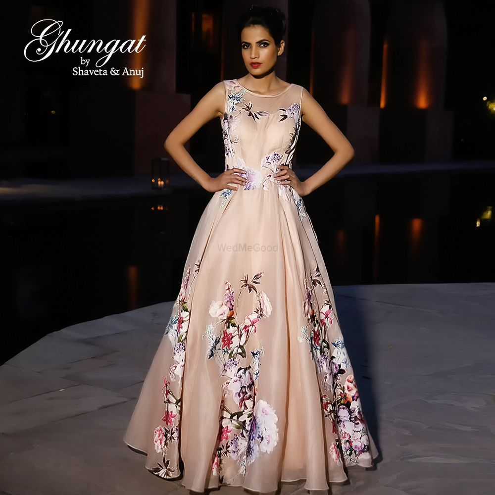 Photo of Light Peach gown with floral prints
