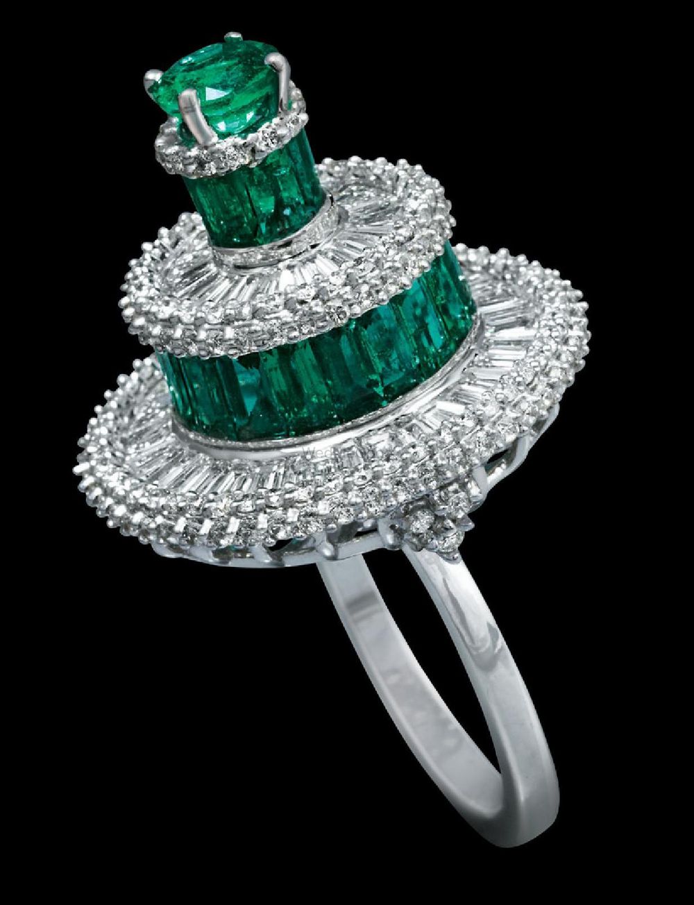 Photo of emerald and diamond cocktail ring