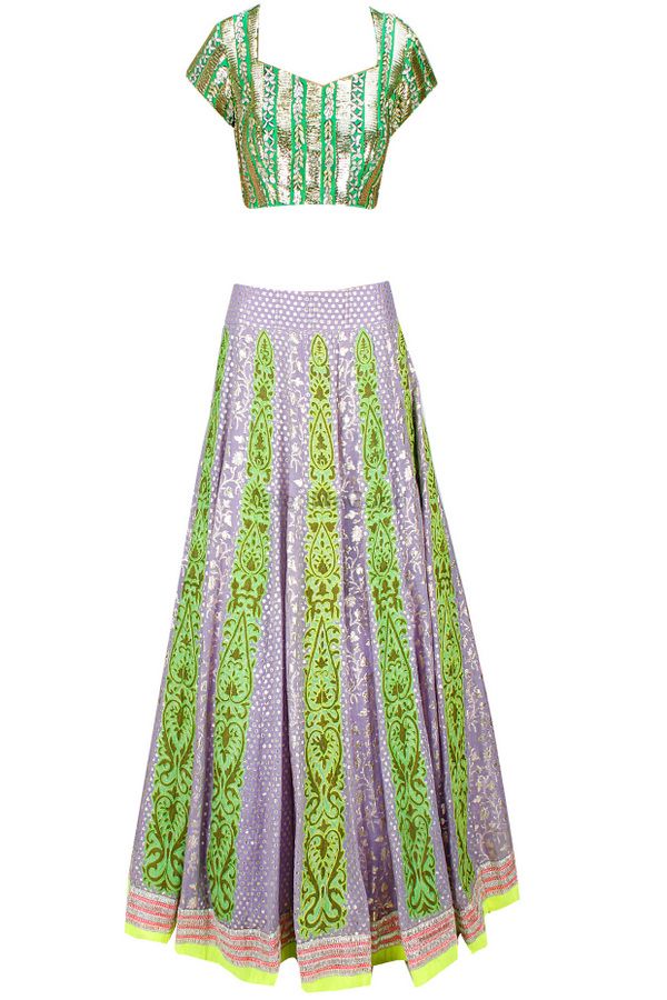 Photo of lavender and lime green lehenga with gota work short sleeves blouse and deep sweetheart neckline . Georgette lehenga with lavender thin panels box pleat lehenga
