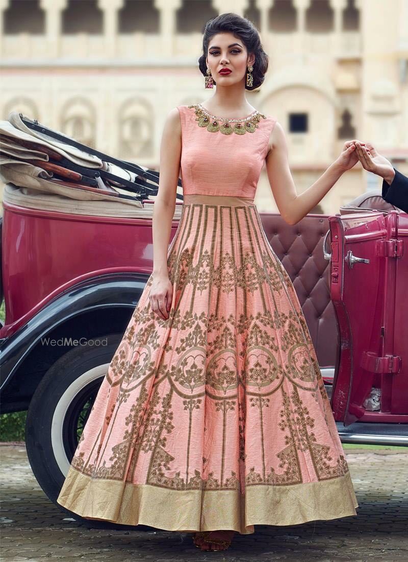 Photo of Light pink crop top and skirt with dull gold work