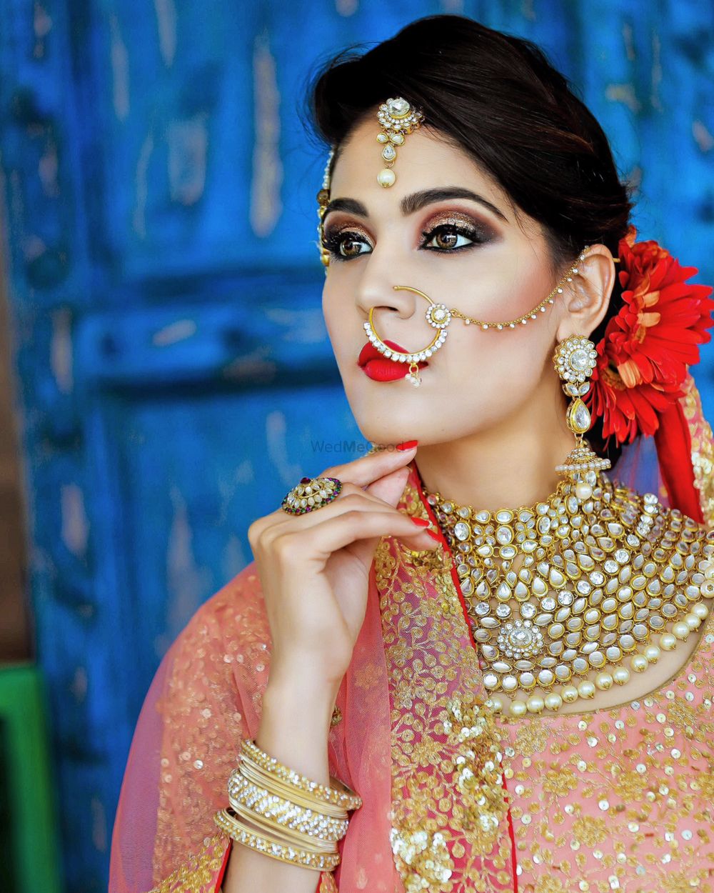 Photo of Red and pink bridal makeup