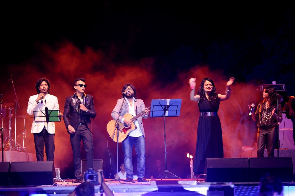 Photo of Pritam with band singing at sangeet