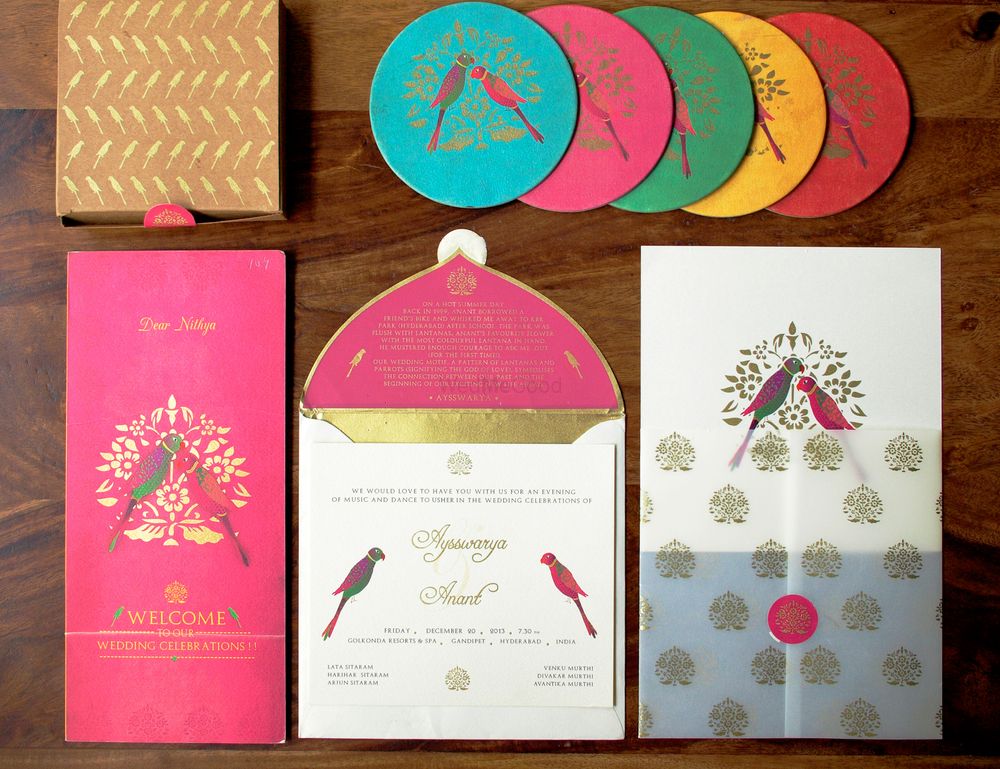 Photo of peacock themed invitation cards