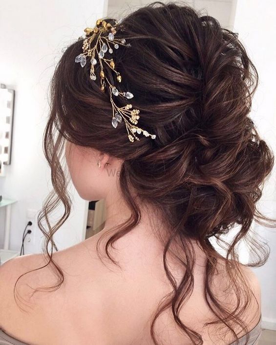 Photo of Messy bun with embellished pin for engagement