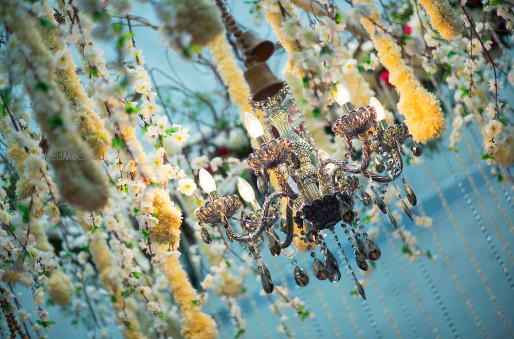 Photo of Ceiling Floral Decor with Chandelier