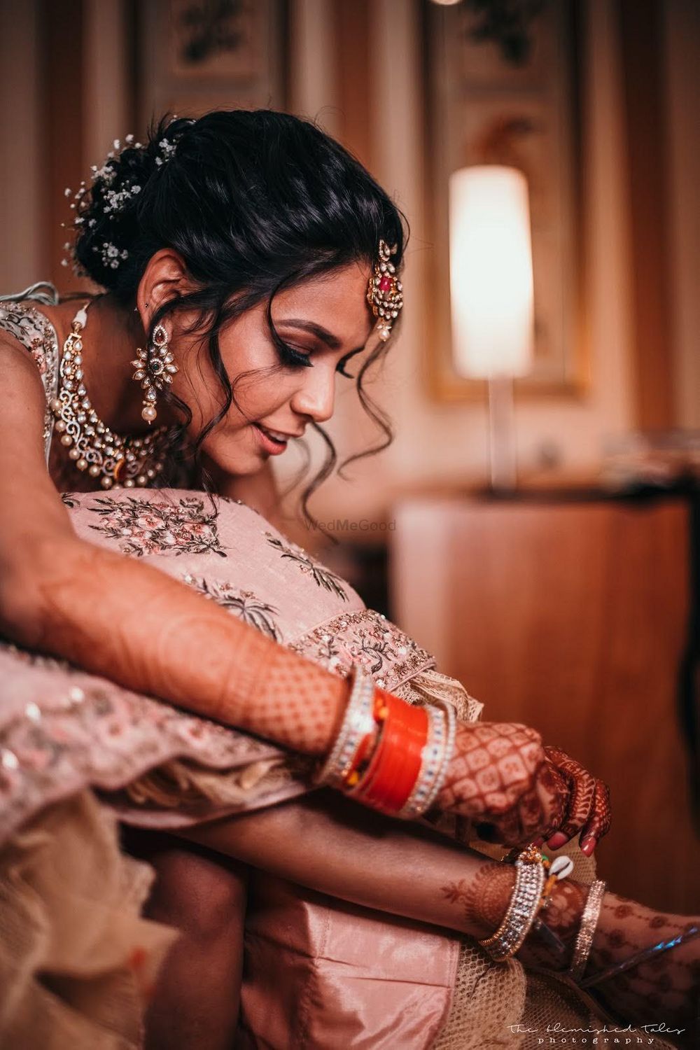 Photo of A bride getting ready for her wedding