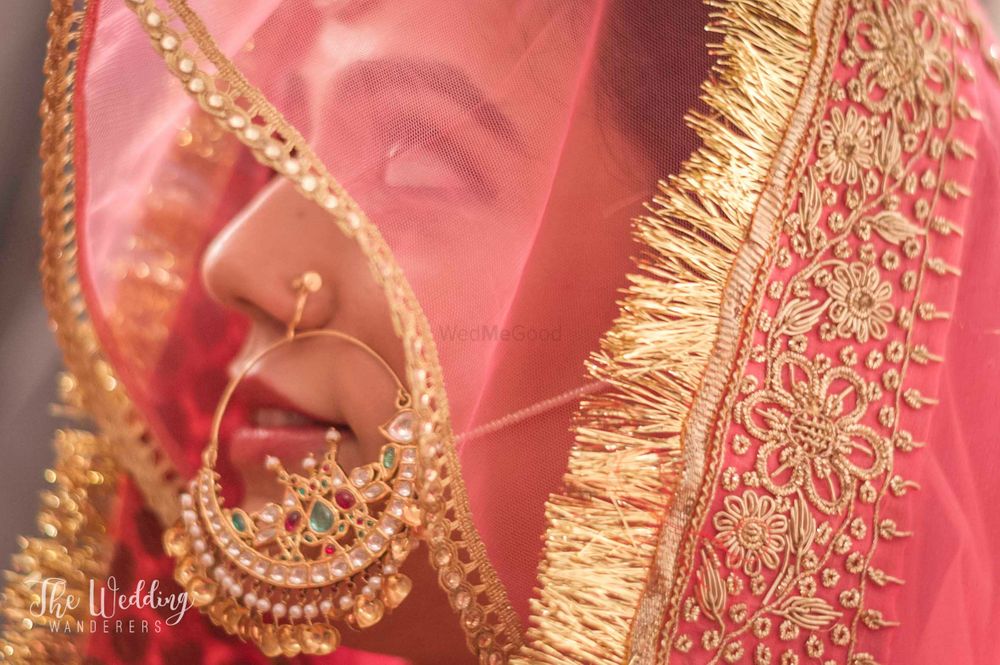 Photo of Oversized bridal Nath in gold