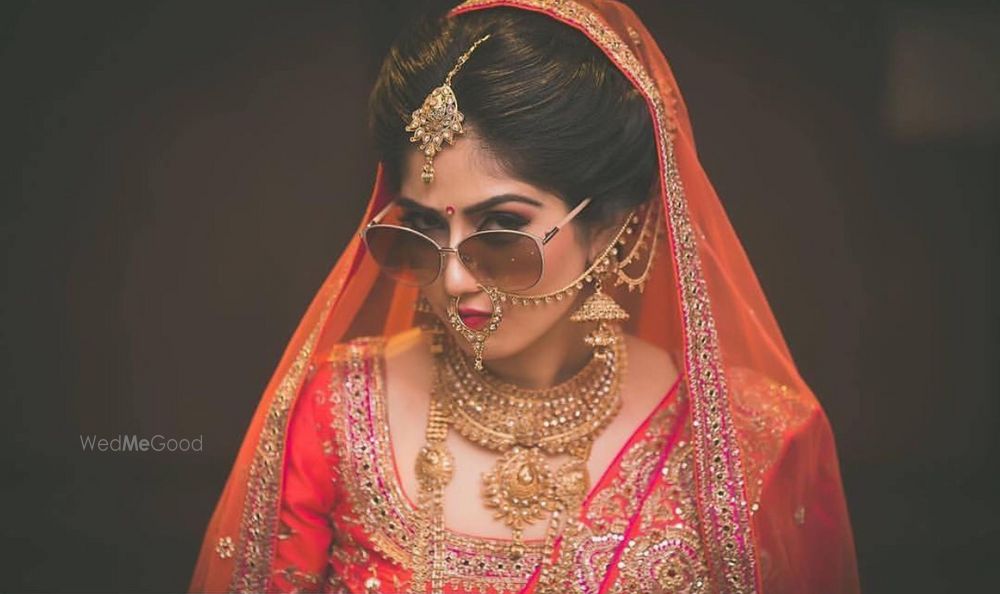 Photo of Fun bridal shot with sunnies