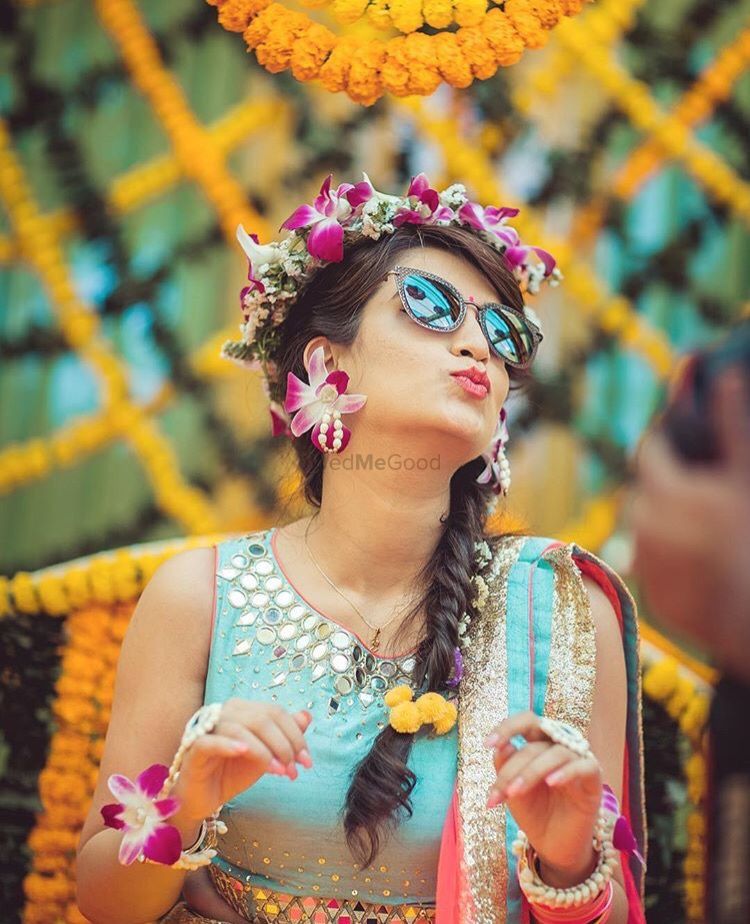 Photo of Side braid with floral wreath and orchid flowers