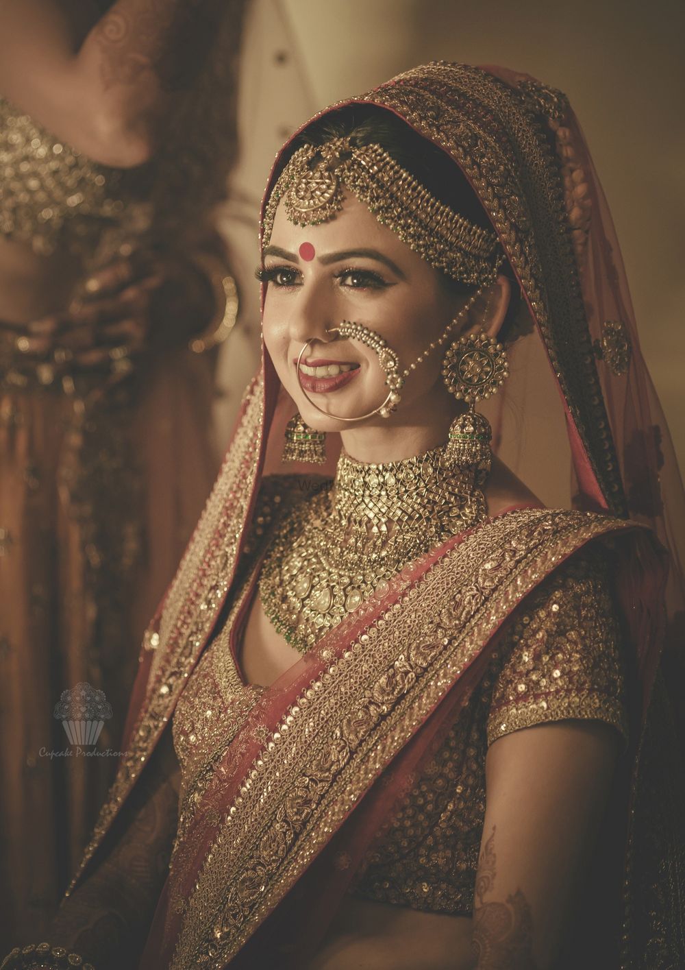 Photo of Bride wearing heavy bridal jewellery
