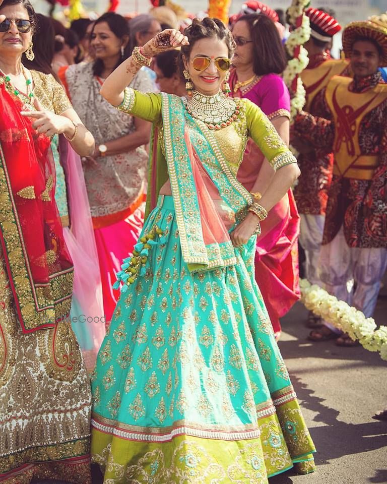 Photo of aqua blue and lime green wedding lehenga