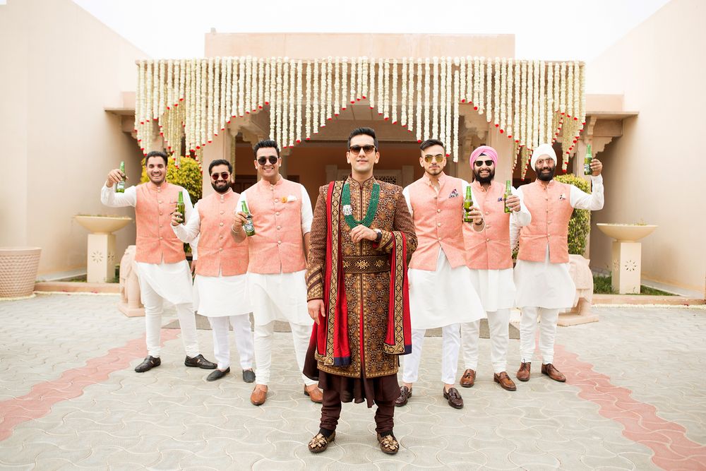 Photo of Offbeat groom sherwani with groomsmen