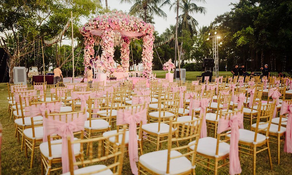 Photo of Gorgeous pink decor with a floral mandap