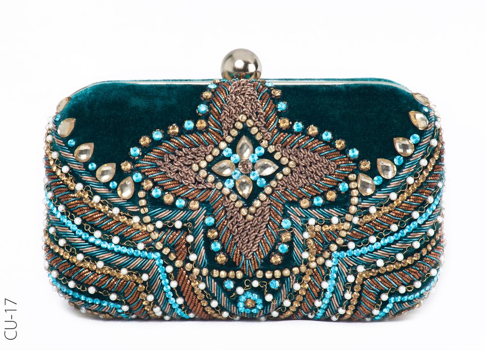 Photo of teal beaded clutch with velvet