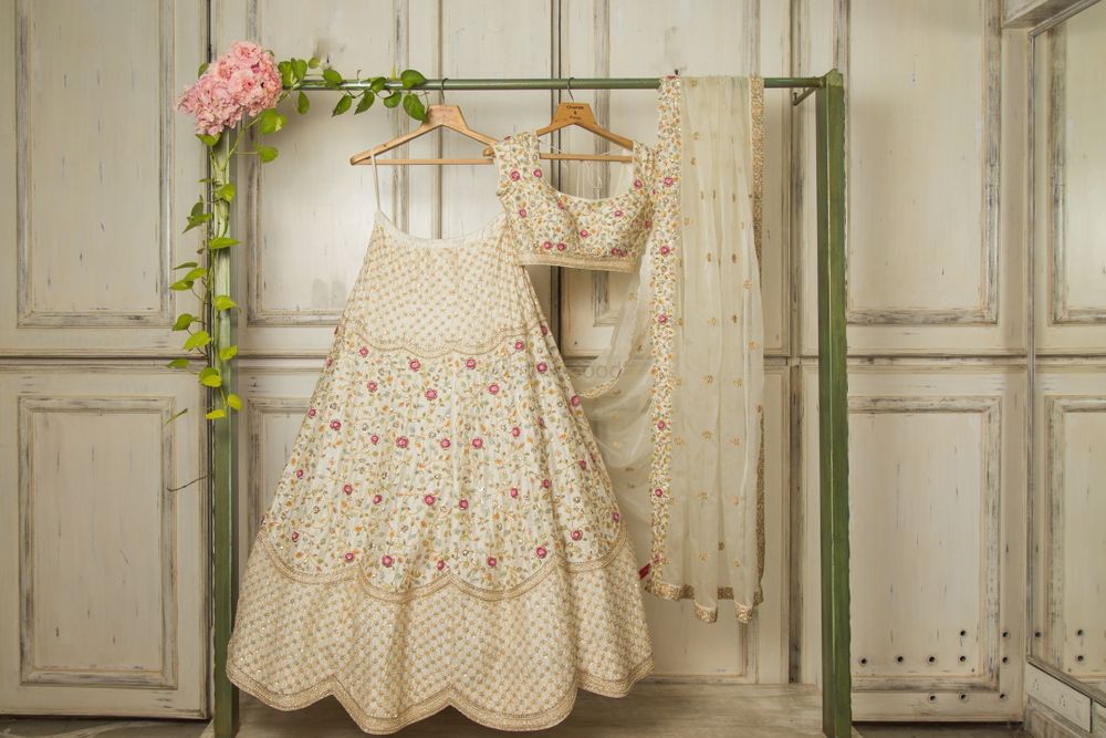 Photo of summery off white lehenga with floral details