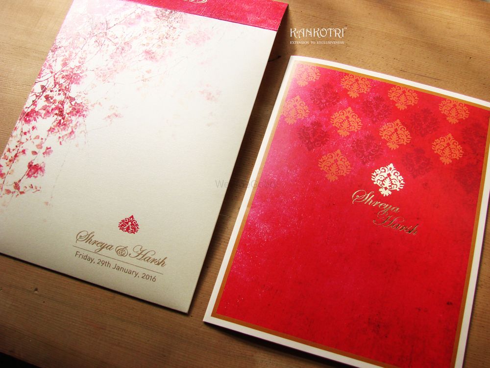 Photo of bright pink wedding cards