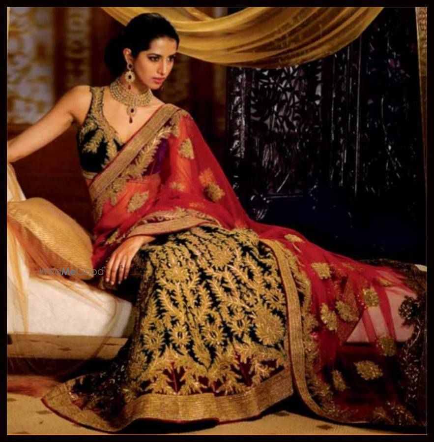 Photo of black and red bridal lehenga