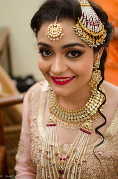 Photo of Bridal Jhoomer with Layered Necklaces with Pink Lehenga