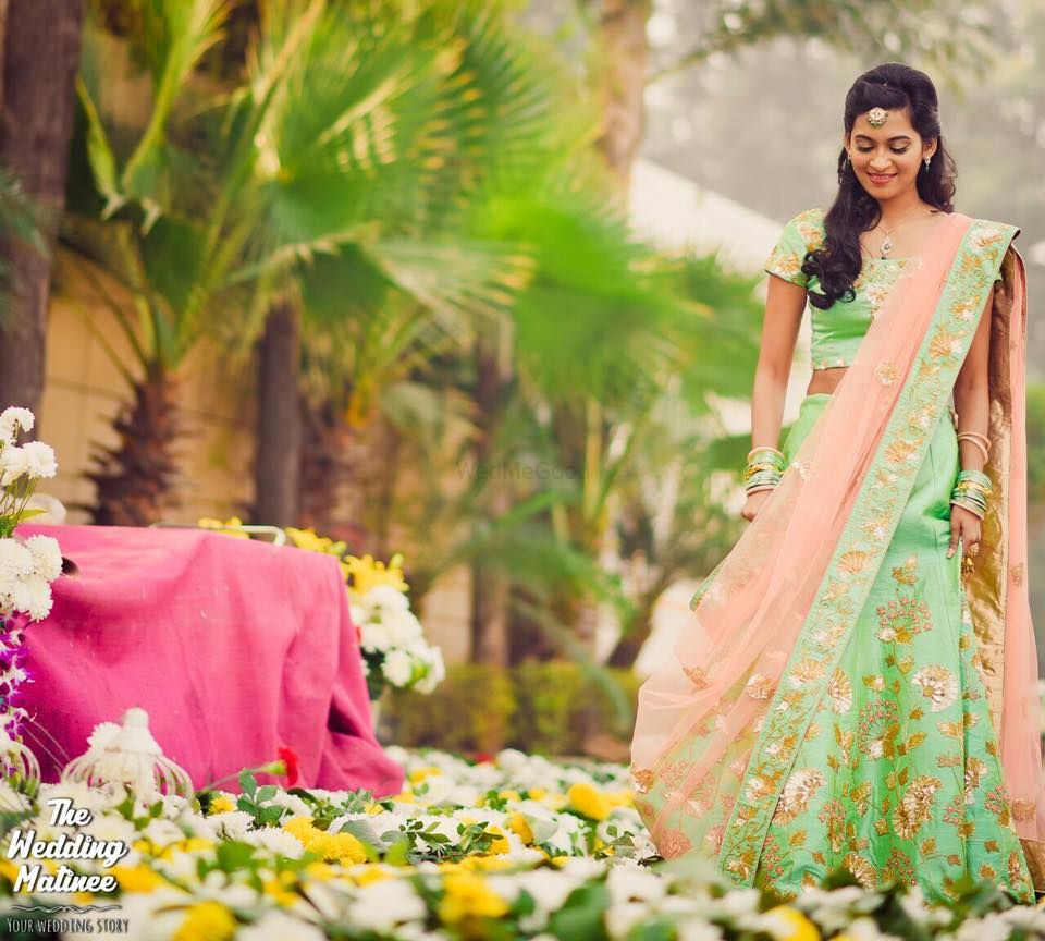Photo of Bride in mint and pink lehenga