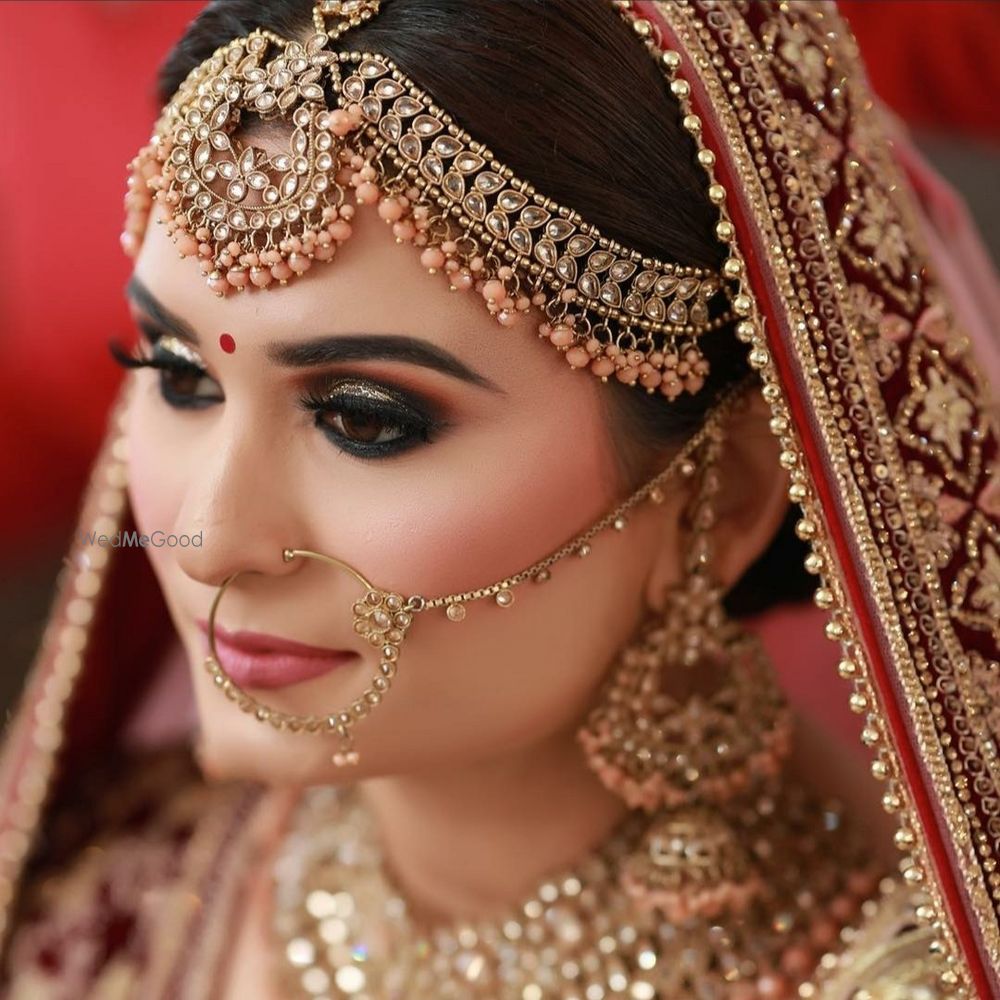 Photo By MAC Unisex Salon - Bridal Makeup