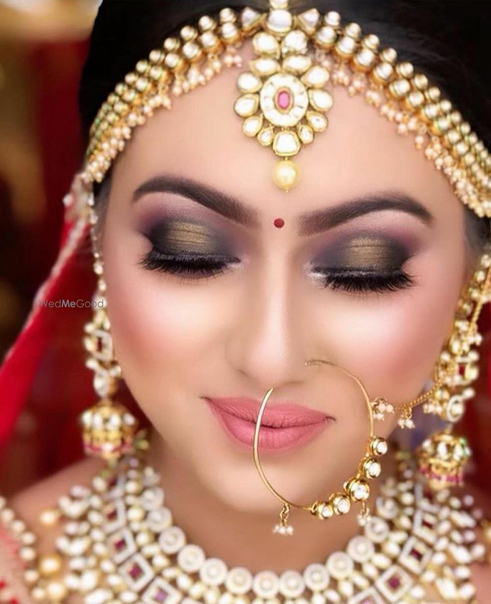 Photo By MAC Unisex Salon - Bridal Makeup