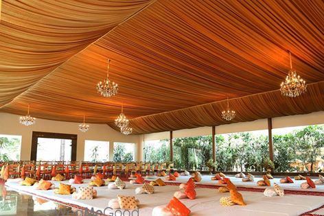 Photo of Orange Tent with Mini Chandeliers Decor