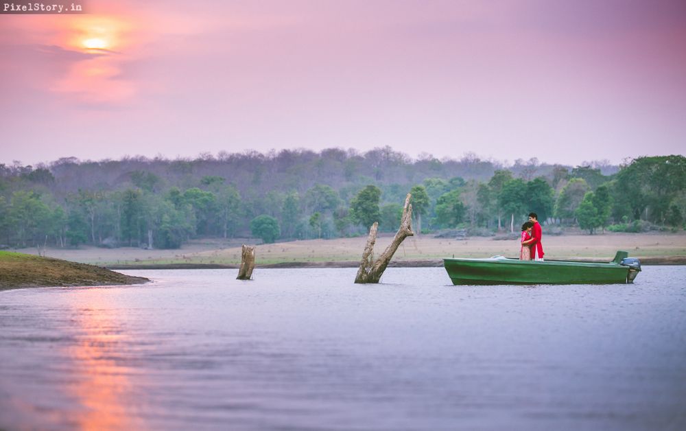 Photo of sunset pre-wedding shoot on a boat