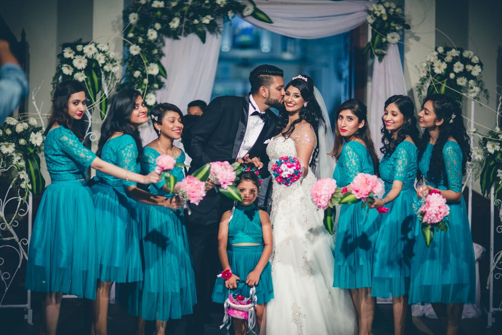 Photo of Christain couple shot with bridesmaids!